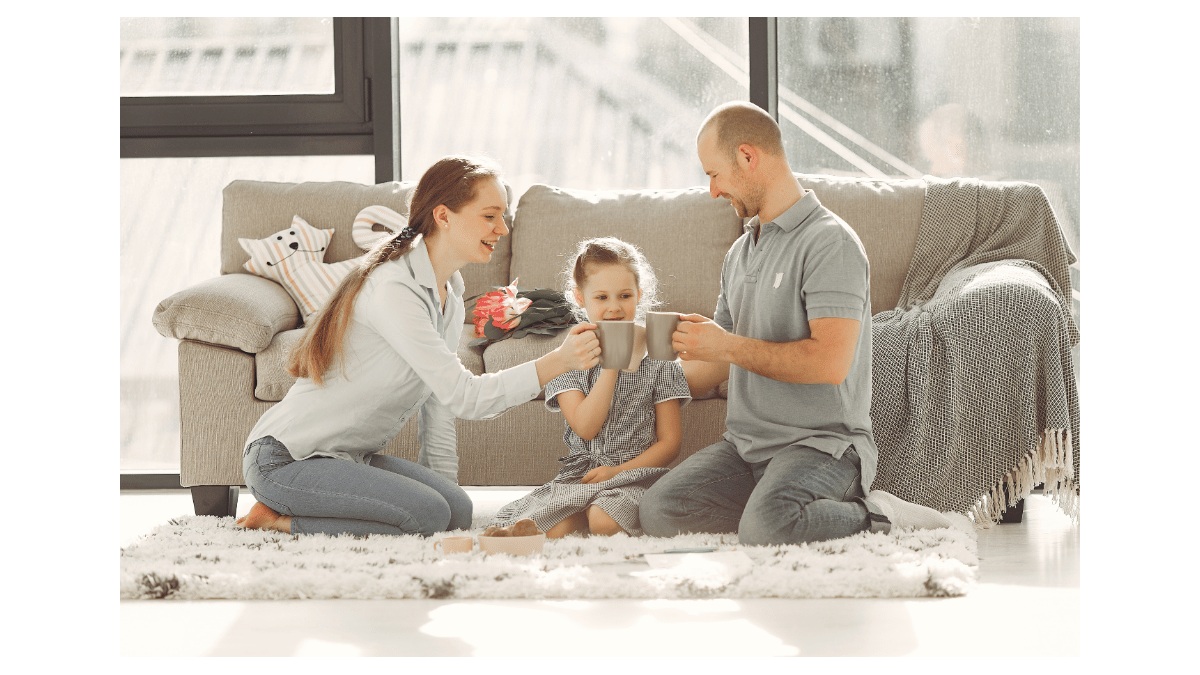 Family toasting with coffee mugs